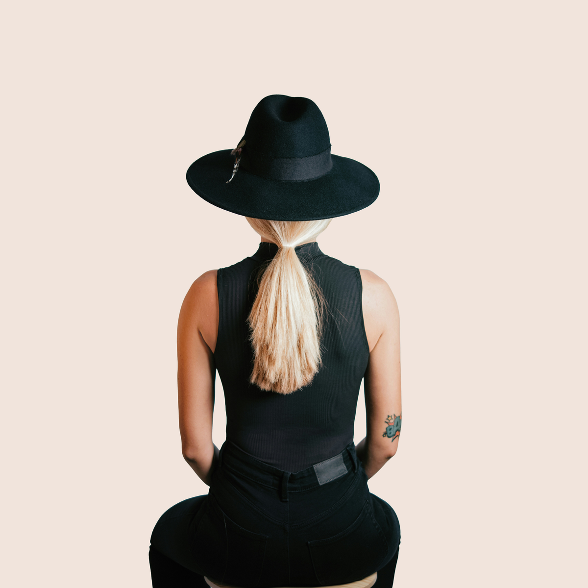 How to Wear a Hat With a Ponytail: What Actually Works