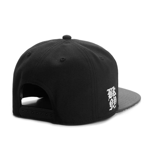 Black Snapback Cap back view