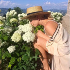 Khaki Straw Boater Hat worn by model – classic straw hat