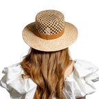 Brown straw raffia boater hat – natural raffia hat worn by model