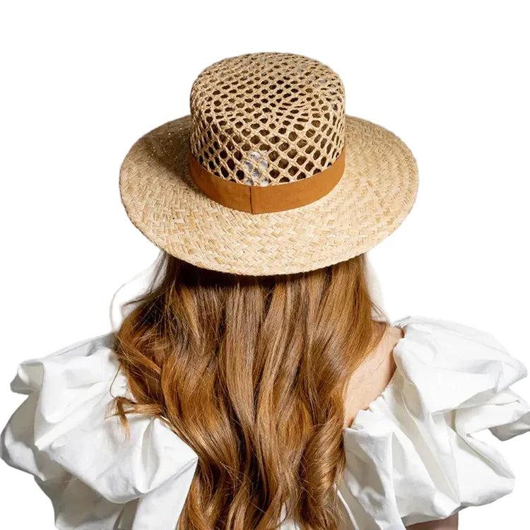 Brown straw raffia boater hat – natural raffia hat worn by model