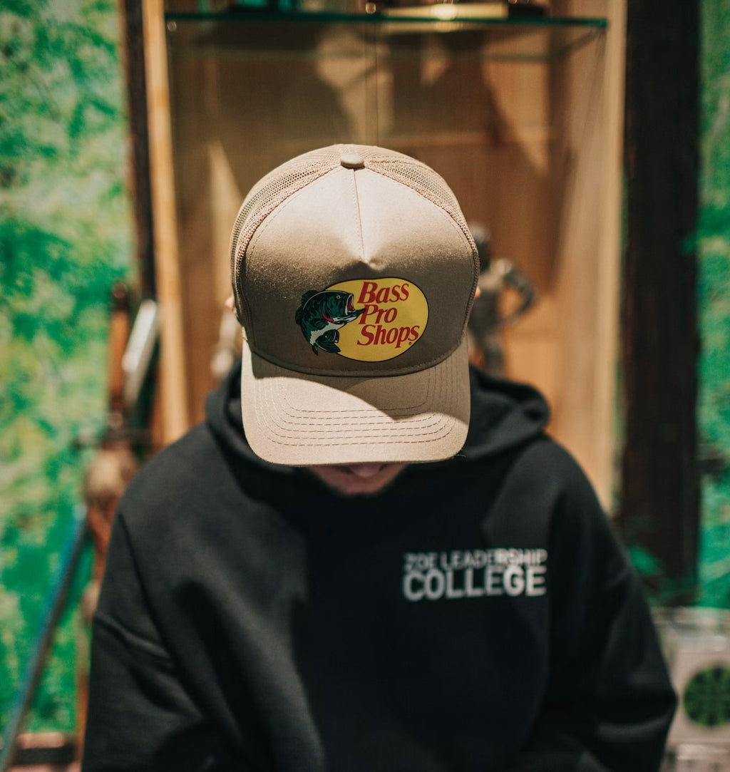 Close-up of a printed logo on a flat-brim snapback cap